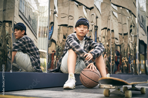 Photography teenage asian child relaxing on street