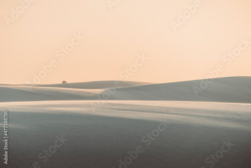 Len    is Maranhenses - Silhouette of one tour car far away on the top of a dune in Len    is Maranhenses national park in Brazil