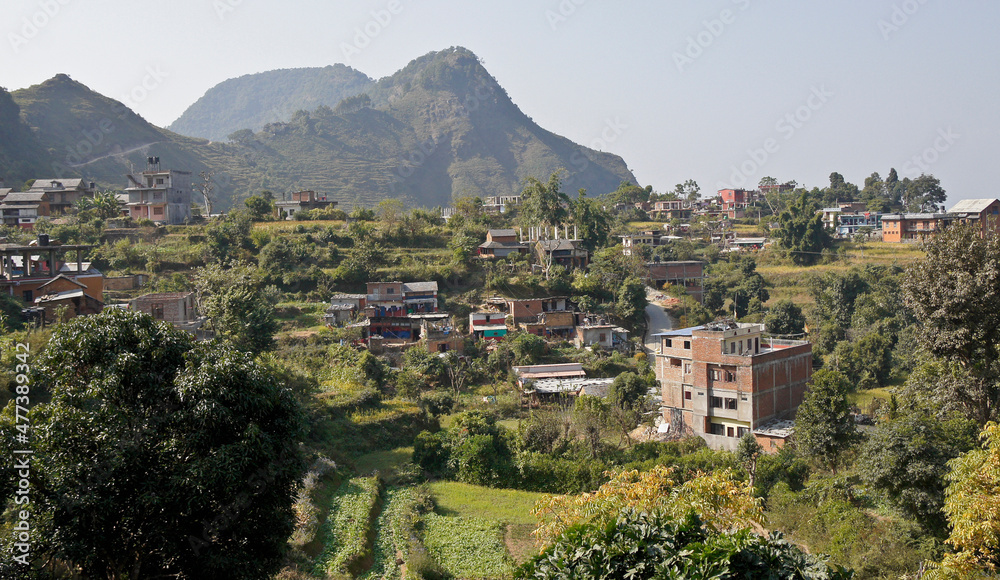 Bandipur, Nepal: Newari houses, fields, and terraces nestle in a saddle of the Mahabharat mountain range in Nepal's Tanahan District