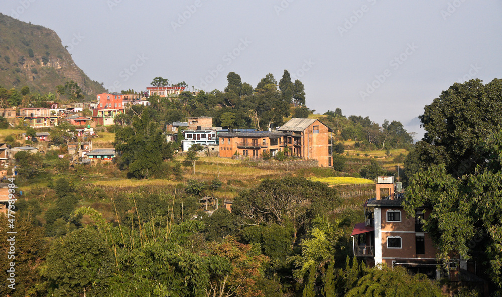 Bandipur, Nepal: Newari houses, fields, and terraces nestle in a saddle of the Mahabharat mountain range in Nepal's Tanahan District