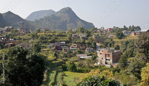 Bandipur, Nepal: Newari houses, fields, and terraces nestle in a saddle of the Mahabharat mountain range in Nepal's Tanahan District photo