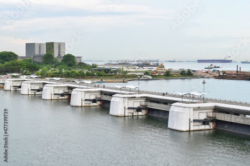 Canvas Print Singapore City, SINGAPORE : 22 November 2019 : The bridge holds the press gates that control water flow at Marina Barrage, This is a dam in Singapore built at the confluence of five rivers