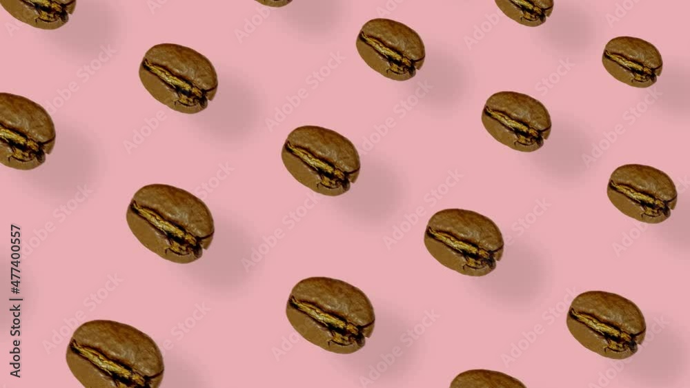 Colorful pattern of coffee beans on pink background with shadows. Seamless pattern with coffee bean. Top view. Realistic animation. 4K video motion Colorful pattern of coffee beans on pink background with shadows. Seamless pattern with coffee bean. Top view. Realistic animation. 4K video motion
