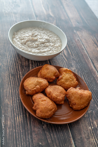 Bowl of Kunun Gyada with Akara bean Cakes ready to eat