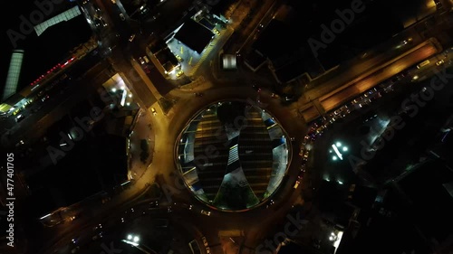 aerial shot of the roundabout in the city at night