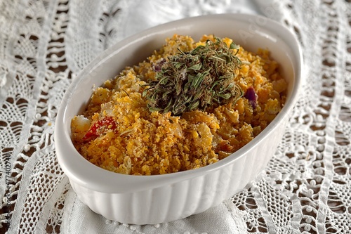 Farofa Crumbbs of marijuana, cornmeal, onions, eggs, tomato and cannabic butter  photo