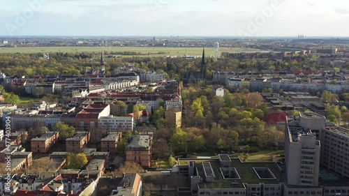 Aerial panoramic view of Kreuzberg with Tempelhof airport field park in the background photo