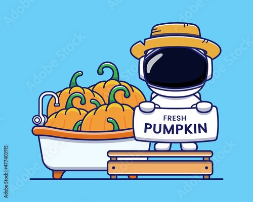 Cute astronaut offering fresh pumpkin