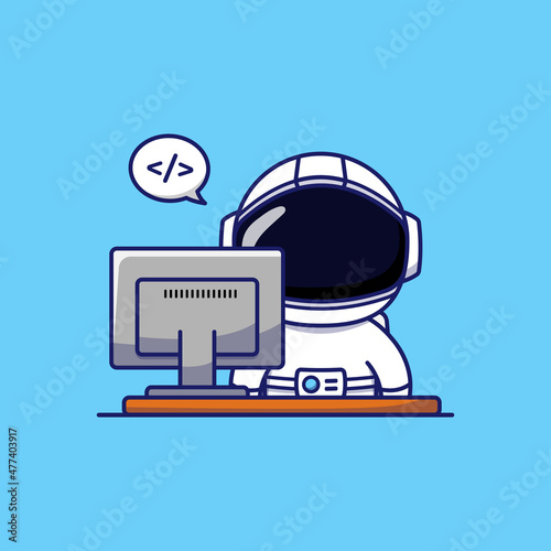 Cute astronaut working in front of his computer