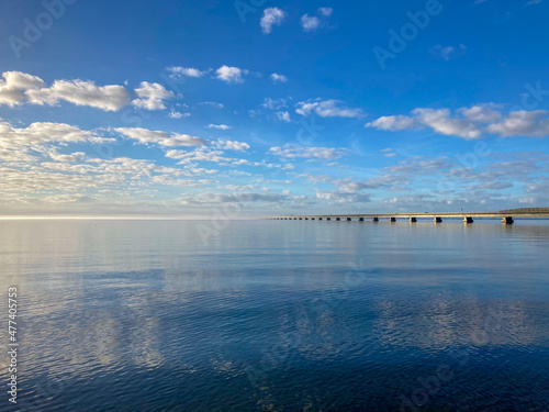 Choctawhatchee Bay and the Mid-Bay Toll Bridge in Destin, Florida during the day photo