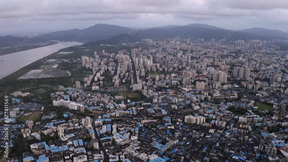 Aerial View Of Mumbai Suburban And Cityscape Along Vasai Creek In Maharashtra, India. Aerial View Of Mumbai Suburban And Cityscape Along Vasai Creek In Maharashtra, India.