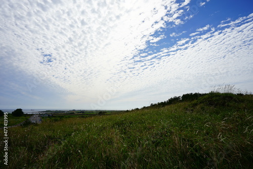 a beautiful landscape with charming clouds