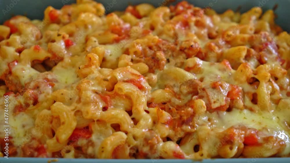 homemade baked macaroni bolognese with cheese - Italian food style homemade baked macaroni bolognese with cheese - Italian food style