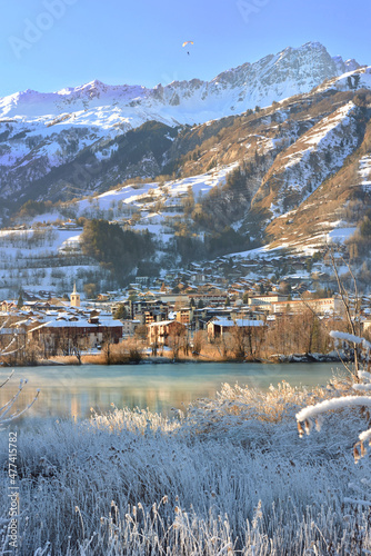 view of a city of Savoy, Bourg Saint Maurice,  on the banks of a river with f...