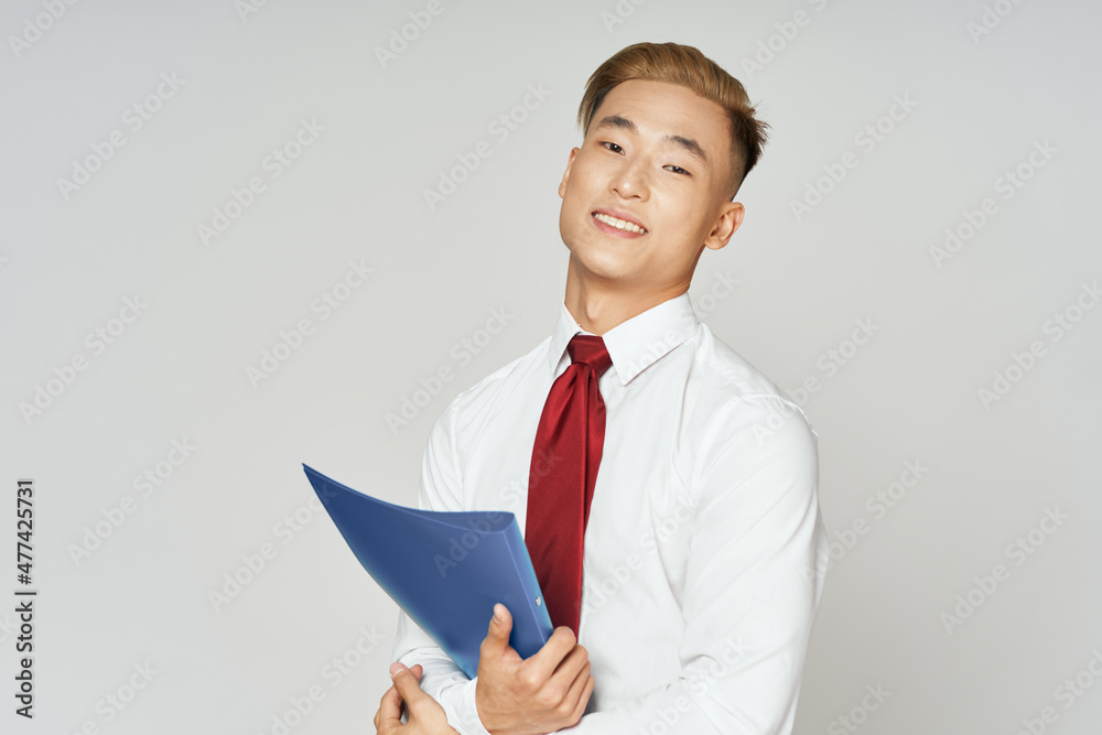 asian man shirt with tie office manager documents asian man shirt with tie office manager documents