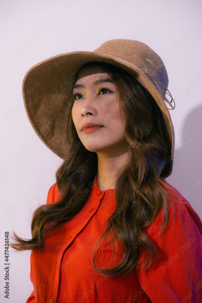 Portrait of young beautiful woman in hat isolated on pink Portrait of young beautiful woman in hat isolated on pink