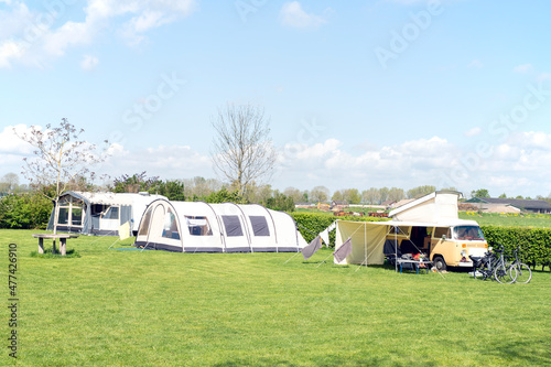 Camping with caravan and shelter in nature © Rob Bouwman