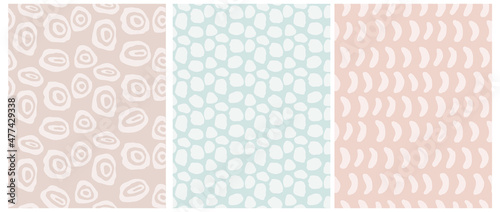 Hand Drawn Abstract Doodles Vector Patterns. Brush Spots, Circles and Dots on a Pastel Blue, Beige and Blush Pink Background. Irregular Geometric Repeatable Vector Print for Textile, Wrapping Paper.