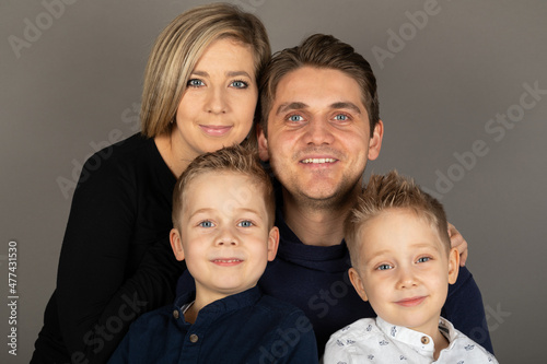 Happy family studio portrait
