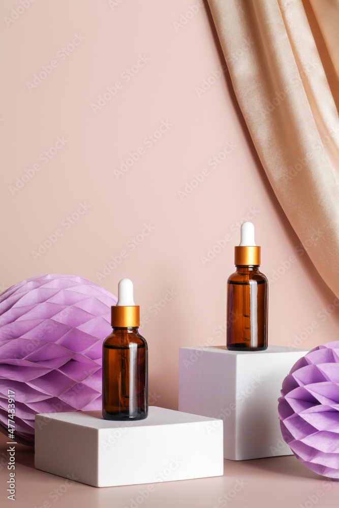 Serum essence on podium stage on beige background with textile and honeycomb paper decor. Skincare cosmetic. product presentation concept