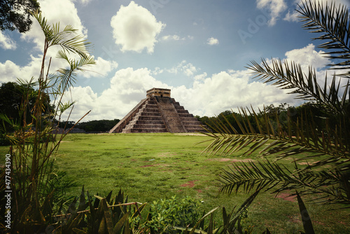 The view of Temple of Kukulcán at Chichen Itza in Yucatan, Mexico from the forest photo