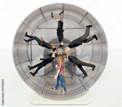 Fotografie Men and women of different nationalities in a hamster wheel