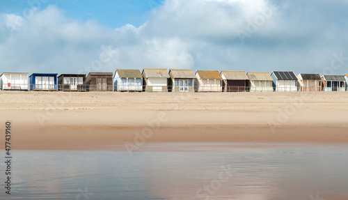 beach huts on beach photo