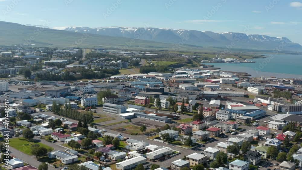 Drone view of Reykjavik, iceland capital city, with colorful house roofs. Aerial view of the old harbor near the city centre, mainly used by fishermen and cruise ships. Travel destination Drone view of Reykjavik, iceland capital city, with colorful house roofs. Aerial view of the old harbor near the city centre, mainly used by fishermen and cruise ships. Travel destination