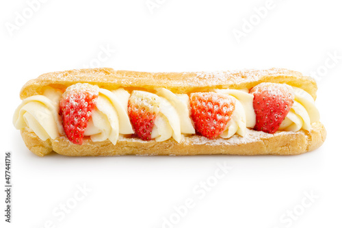 Elegant and Expensive Eclair or Choux Cream in long shape with whipped cream cheese, topped with fresh strawberries, famous sweets isolated on white background. Clipping path