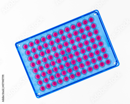 A microplate or microtiter plate or  microwell plate, multiwell,  is a flat plate with multiple  wells  used as small test tubes.    photo