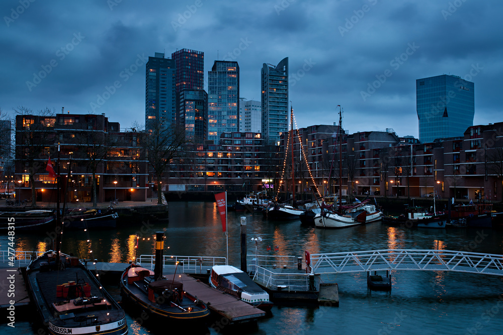 Fototapeta premium photo of the evening city with a large number of lights of the river buildings