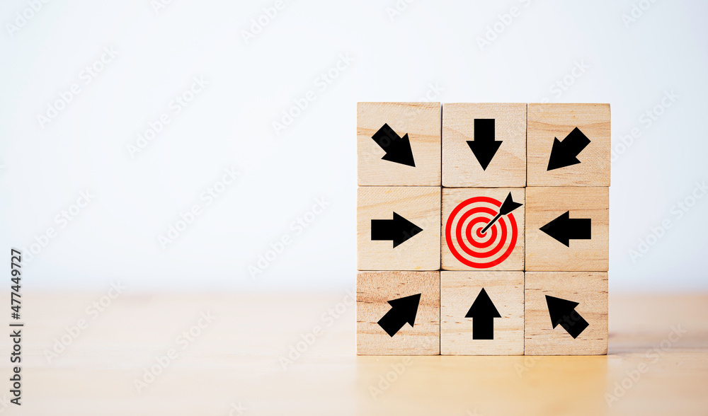 Red dartboard with red arrow among black arrow for focus to business objective target concept.