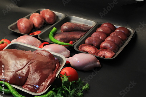 Obraz na plátně Photographs of red meat, offal and meat varieties.