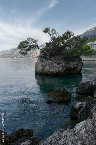 The symbol of Brela is "Kamen Brela" (Brela Stone), a small rock island just off the main beach in touristic resort Brela, the Punta Rata beach in Croatia