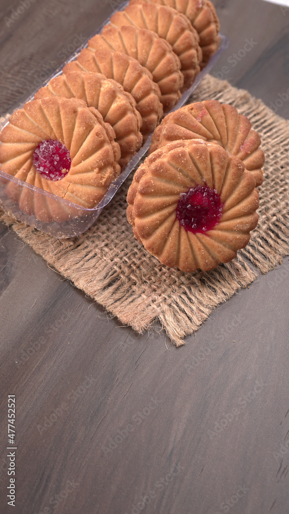 Fototapeta premium Top view of Sweet jam biscuits. Sandwich biscuits or Cream biscuits isolated.