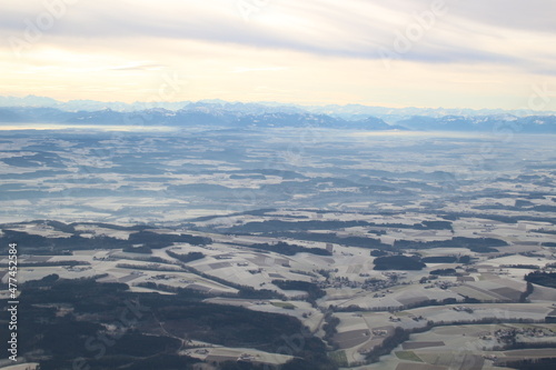 aerial view of german landscape with mountains in the background 