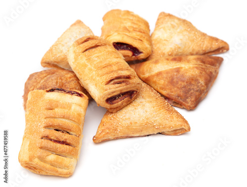 Puff pastries with jam isolated on a white background.