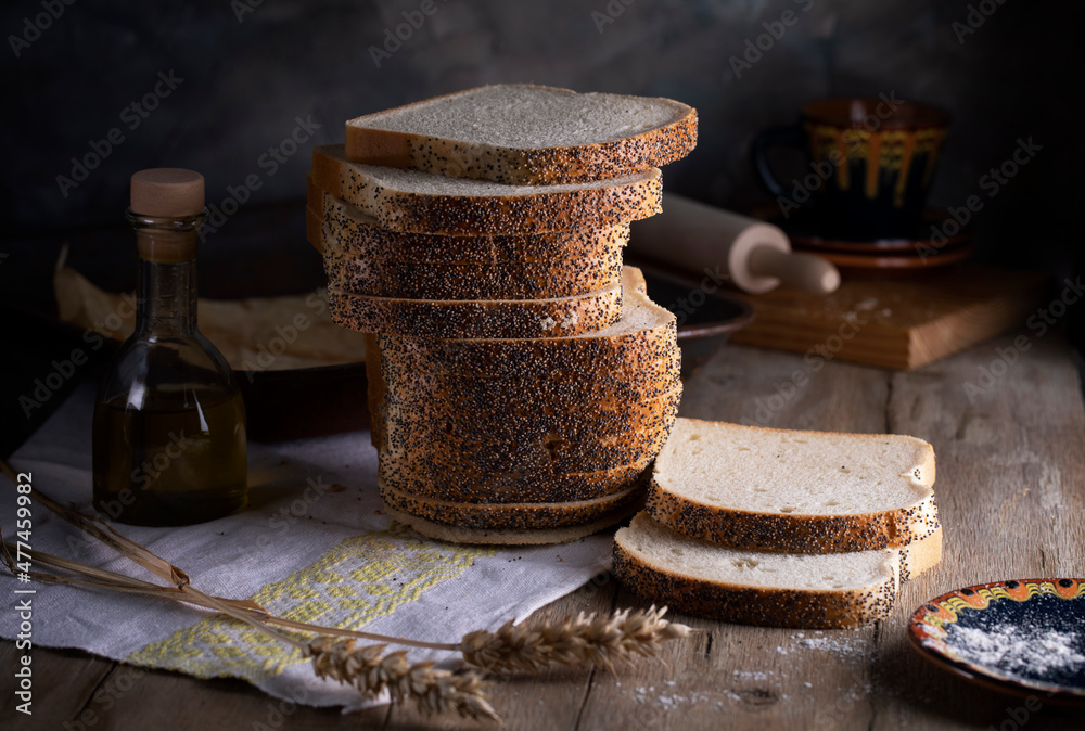 White wheat sliced bread on a wooden table White wheat sliced bread on a wooden table