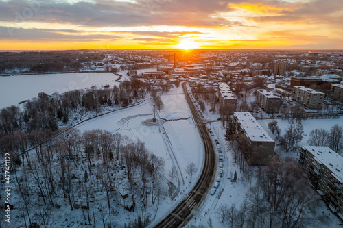 Aerial winter sunny frozen morning view of snowy city of Šiauliai, Lithuania