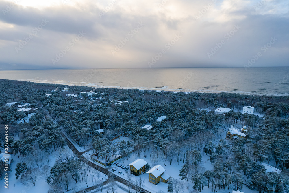Aerial winter sunny frozen day view of snowy resort Palanga, Lithuania
