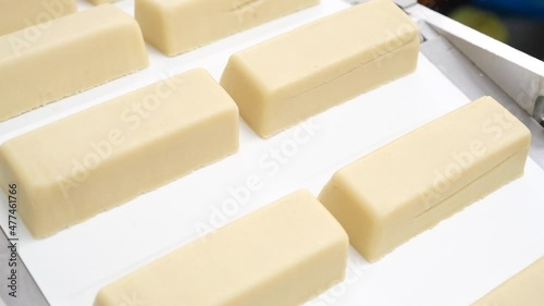 Molded Marzipan blocks rolling of a factory production line