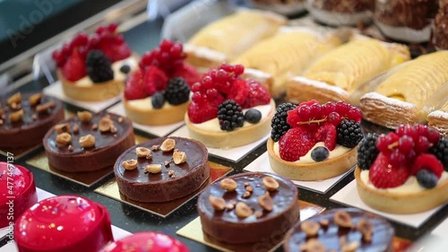 Pano leftover assortment luxurious pastries and tarts in counter of a bakery shop