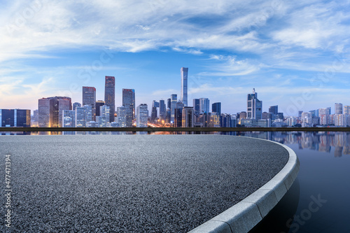 Panoramic skyline and modern commercial buildings with empty circular square in Beijing, China Fotobehang
