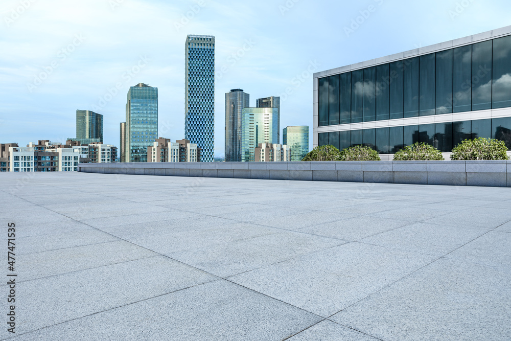 Panoramic skyline and modern commercial office buildings with empty square floors in Beijing