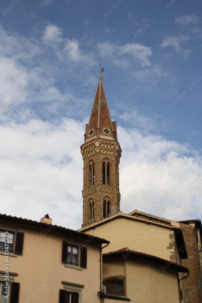 Bell Tower of the Badia Fiorentina (Abbazia di Santa Maria, Abbey), ancient church in Florence downtown, in Gothic and Baroque style. Tuscany, Italy, Europe.