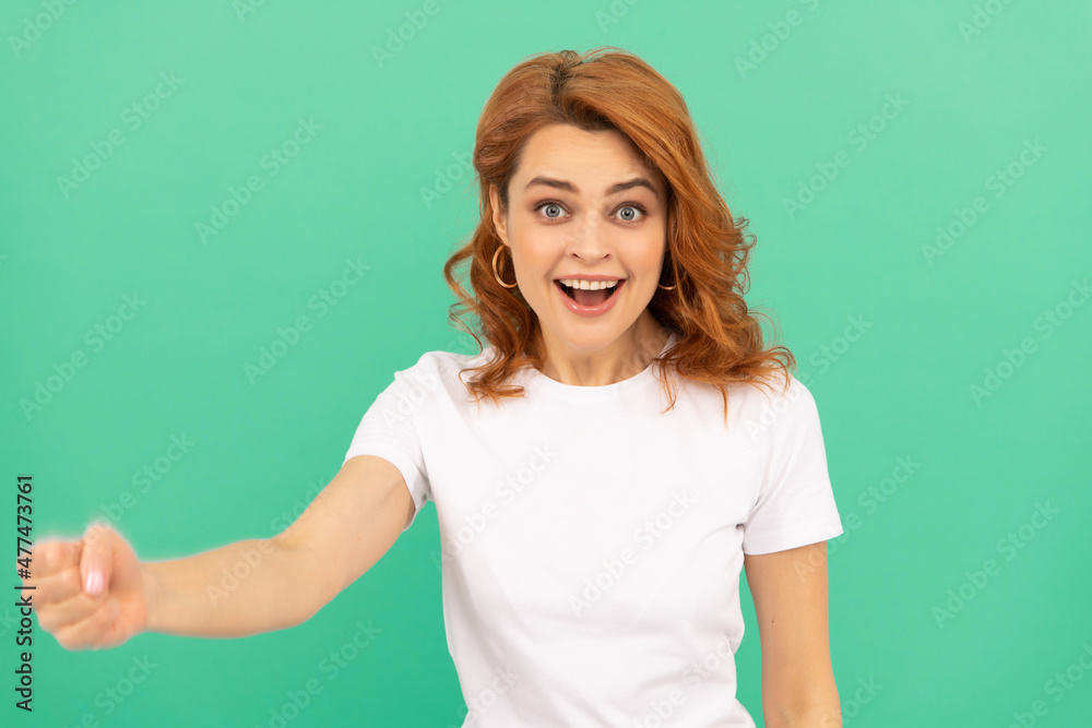 happy redhead woman with curly hair on blue background, happiness happy redhead woman with curly hair on blue background, happiness