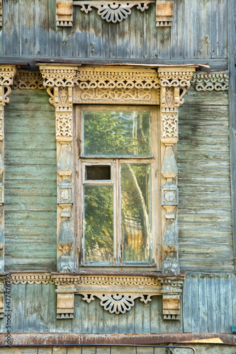 Carved window on an old traditional Russian house in Ryazan, Russia photo