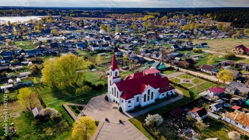 cathedral in the village and lake landscape photo