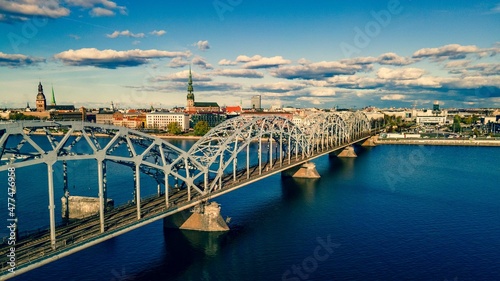  iron bridge over the Daugava river with view on Riga old town