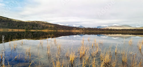 panoramic view of mountain and lake in the fall. hiking and relaxation concept.